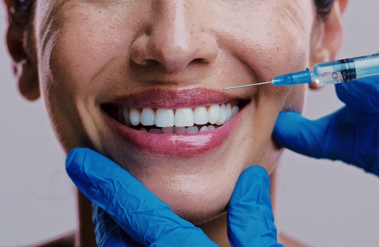 beautician doing lip flip procedure